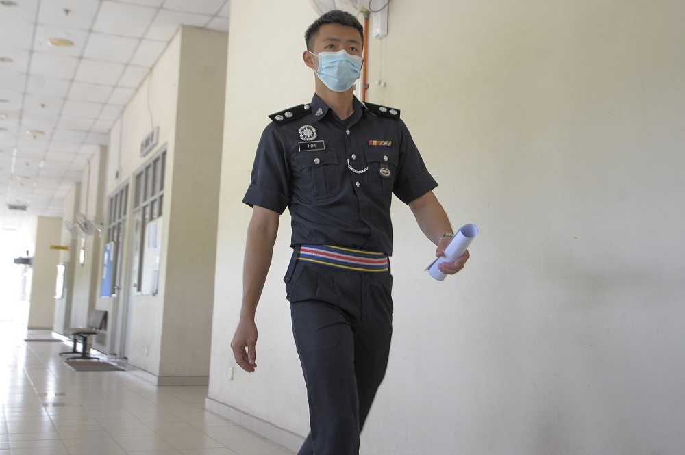 General Operations Force Fourth Battalion operative Inspector Hor Ming Jai at Seremban Court complex October 20, 2020. u00e2u20acu2022 Picture by Shafwan Zaidon