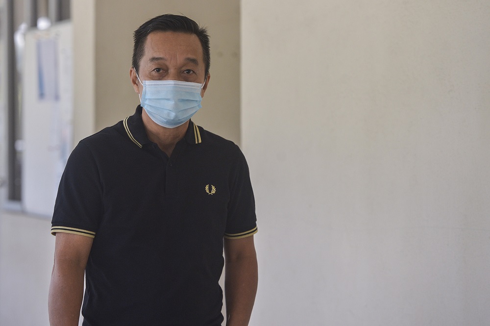 Search-and-rescue operation volunteer Chong Yue Fatt at the Seremban Court complex October 21, 2020. u00e2u20acu201d Picture by Miera Zulyana