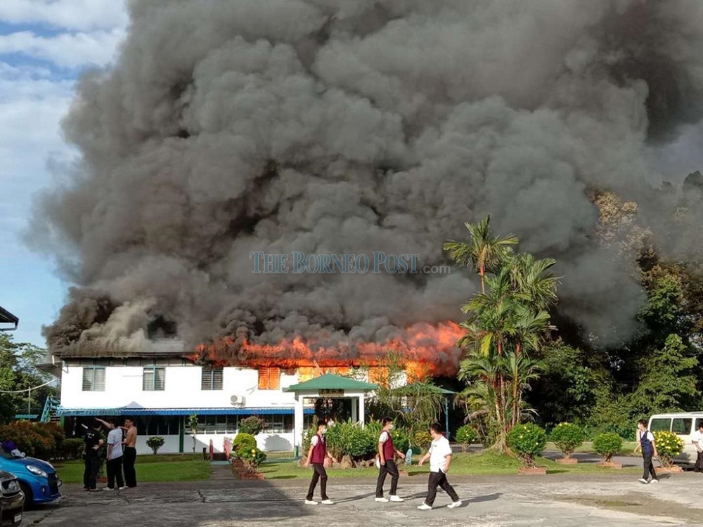 The blaze at the two-storey hostel of SM Citizen Middle School at Jalan Kong Yit Khim in Sibu. u00e2u20acu201d Borneo Post Online pic