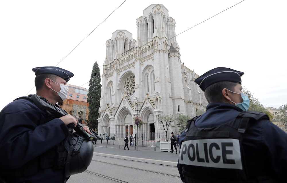 Police officers stand guard at the scene of a reported knife attack at Notre Dame church in Nice, France, October 29, 2020. u00e2u20acu201d Reuters pic