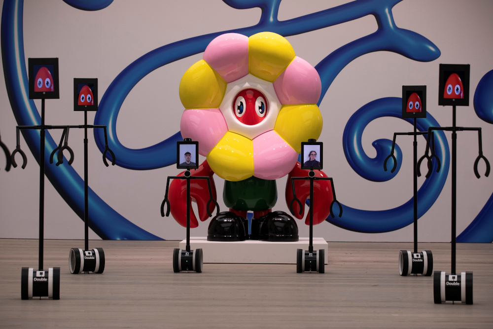 Philip Colbert uses one of the robots that allow viewers to interactively engage with his Lobsteropolis exhibition at at the Saatchi Gallery in London, Britain, October 28, 2020. u00e2u20acu201d Reuters pic 
