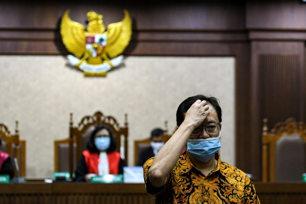 Benny Tjokrosaputro is seen during the trial of a corruption case in financial management and investment funds of PT Asuransi Jiwasraya at the court in Jakarta, Indonesia, September 7, 2020, u00e2u20acu201d Antara Foto/M Risyal Hidayat handout pic via Reuters. 