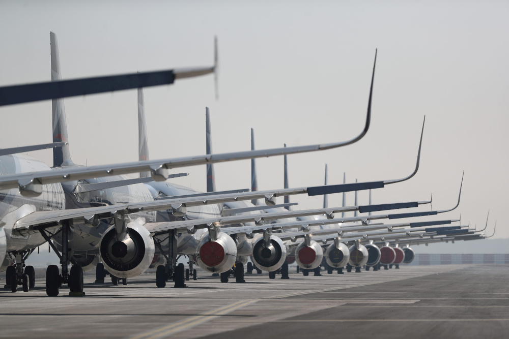Passenger planes parked on a runway are seen during a general quarantine amid the spread of the coronavirus disease at the Arturo Merino Benitez International Airport, in Santiago, Chile May 26, 2020. u00e2u20acu201d Reuters pi