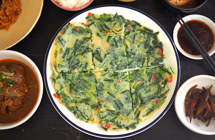 Order a portion of chives pancake to enjoy with the meal.