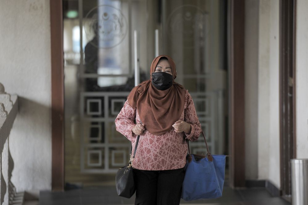 Former Malaysian External Intelligence Organisation chief Datuk Hasanah Abdul Hamid arrives at the Kuala Lumpur High Court October 8, 2020. u00e2u20acu201d Picture by Shafwan Zaidon