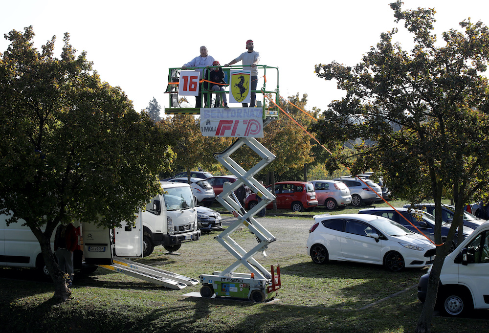 Fans watch during the Emilia Romagna Grand Prix practice session at the Autodromo Enzo e Dino Ferrari in Imola, Italy, October 31, 2020. u00e2u20acu201d Reuters picnn