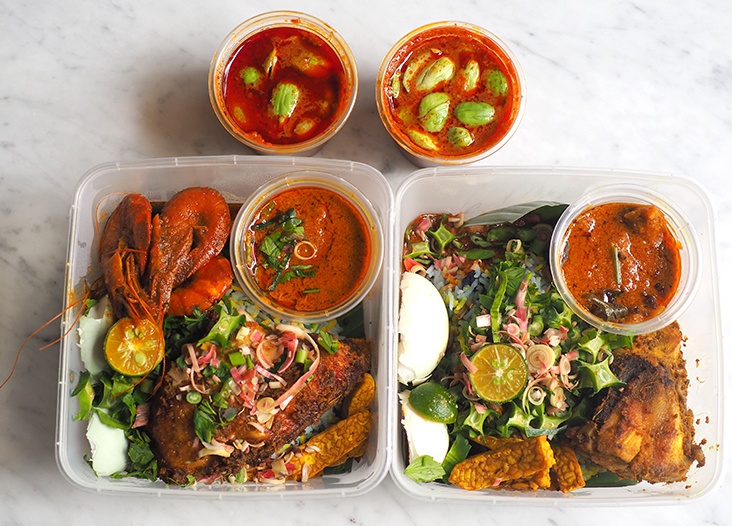 Each box is stuffed with goodies served with their 'nasi ulam' Nyonya