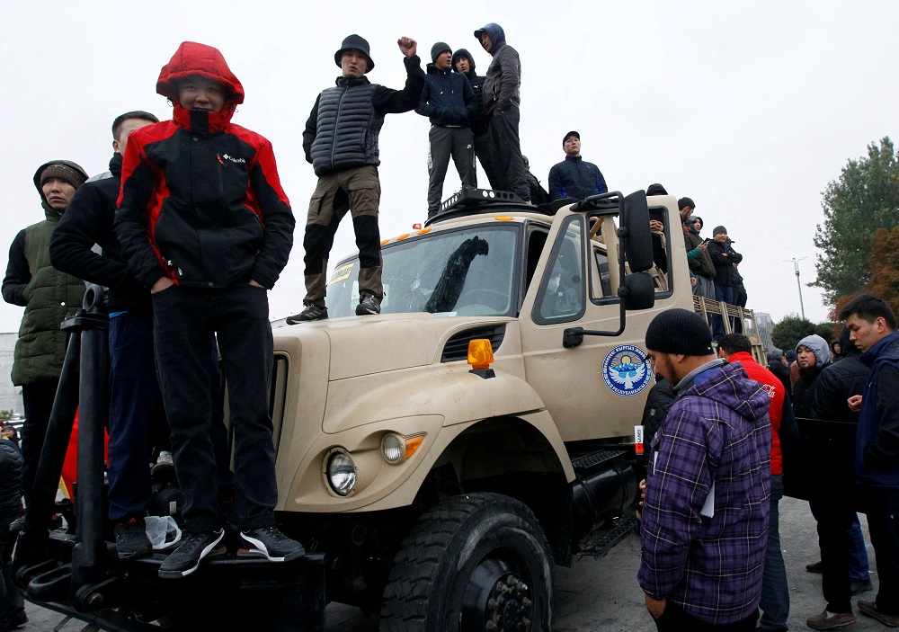 Demonstrators stand atop a vehicle during a protest against the results of a parliamentary election in Bishkek, Kyrgyzstan October 6, 2020. u00e2u20acu2022 Reuters pic
