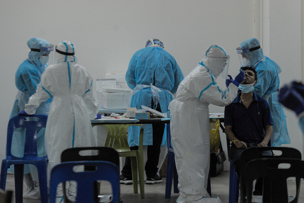 MOH healthcare workers carry out Covid-19 screening at Pelangi Damansara block in Petaling Jaya October 22, 2020. u00e2u20acu201d Picture by Shafwan Zaidon