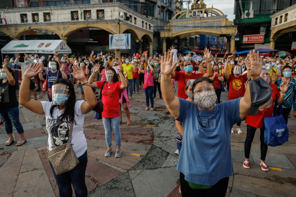 Filipino devotees attend mass while maintaining social distancing outside the Minor Basilica of the Black Nazarene, amid the coronavirus disease outbreak, in Quiapo, Manila, Philippines, October 2, 2020. u00e2u20acu201d Reuters pic
