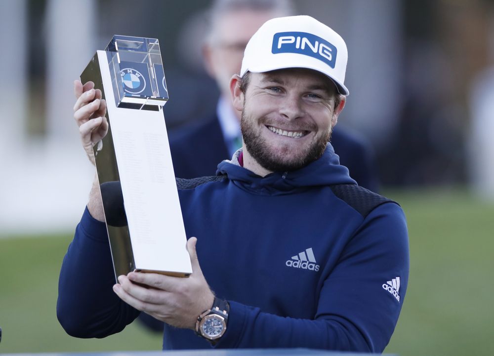 Englandu00e2u20acu2122s Tyrrell Hatton poses with the BMW PGA Championship trophy as he celebrates after his victory at the Wentworth Golf Club October 11, 2020. u00e2u20acu201d Reuters pic