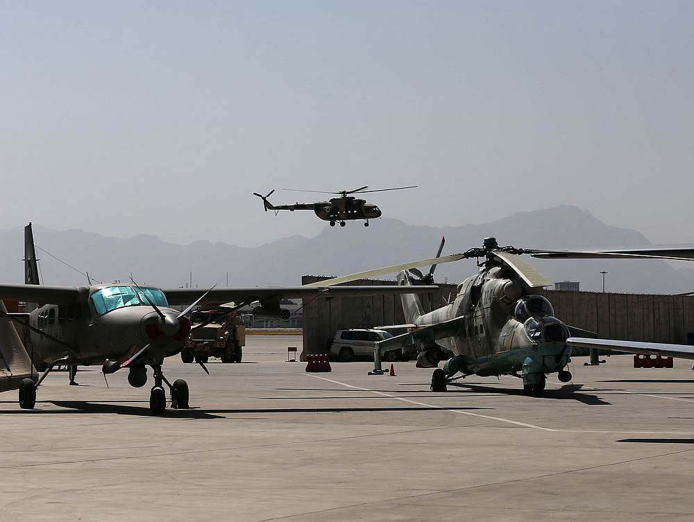 A Russian made helicopter flies during a handover ceremony of A-29 Super Tucano planes from US to the Afghan forces, in Kabul, Afghanistan September 17, 2020. u00e2u20acu201d Reuters pic