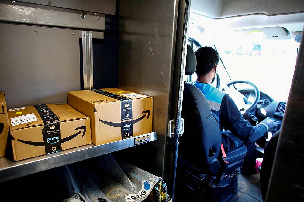 An Amazon worker delivers packages amid the Covid-19 outbreak in Denver, Colorado April 22, 2020. u00e2u20acu201d Reuters pic