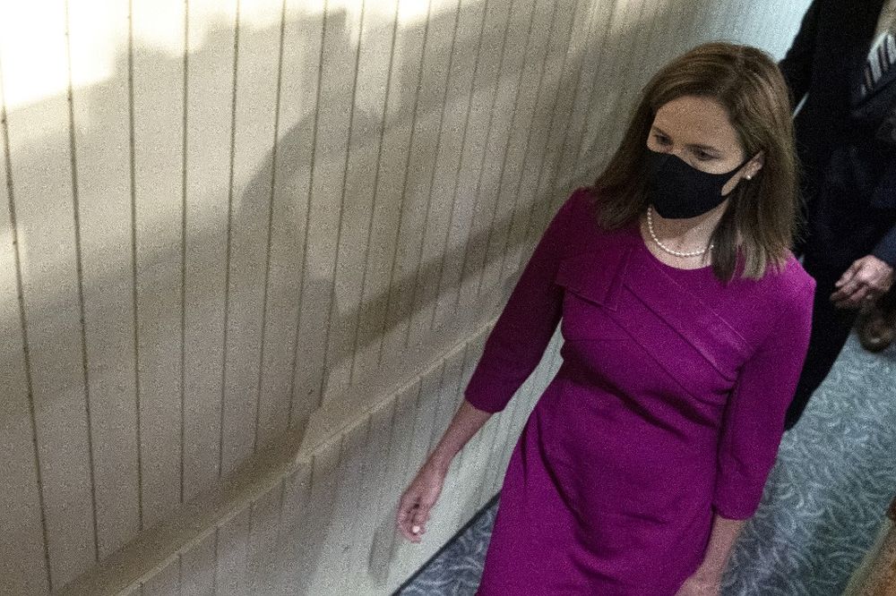 Supreme Court nominee Judge Amy Coney Barrett arrives to testify before the Senate Judiciary Committee confirmation hearing for Supreme Court Justice on Capitol Hill, October 12, 2020 in Washington, DC. u00e2u20acu201d Getty Images  via AFP