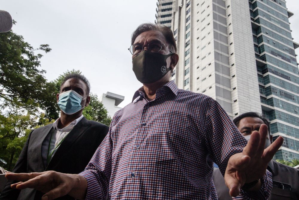 Datuk Seri Anwar Ibrahim is pictured at Bukit Aman after giving his statement to the police in Kuala Lumpur October 16, 2020. u00e2u20acu201d Picture by Firdaus Latif