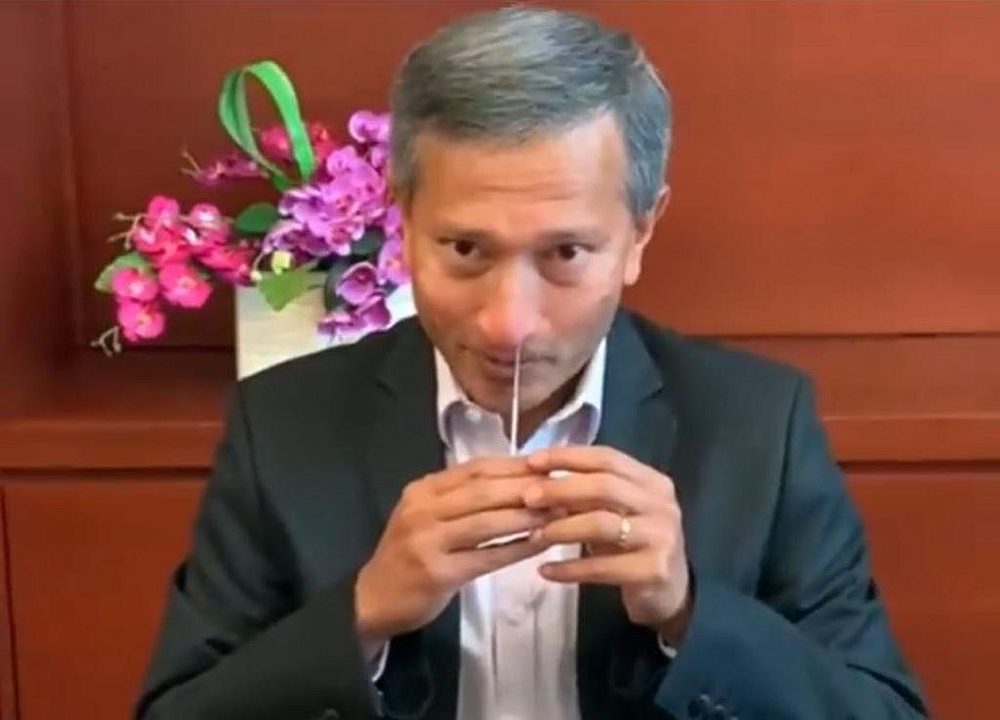 Vivian Balakrishnan demonstrating how the antigen rapid test is done. u00e2u20acu201d Picture courtesy of Vivian Balakrishnan/Facebook via TODAY