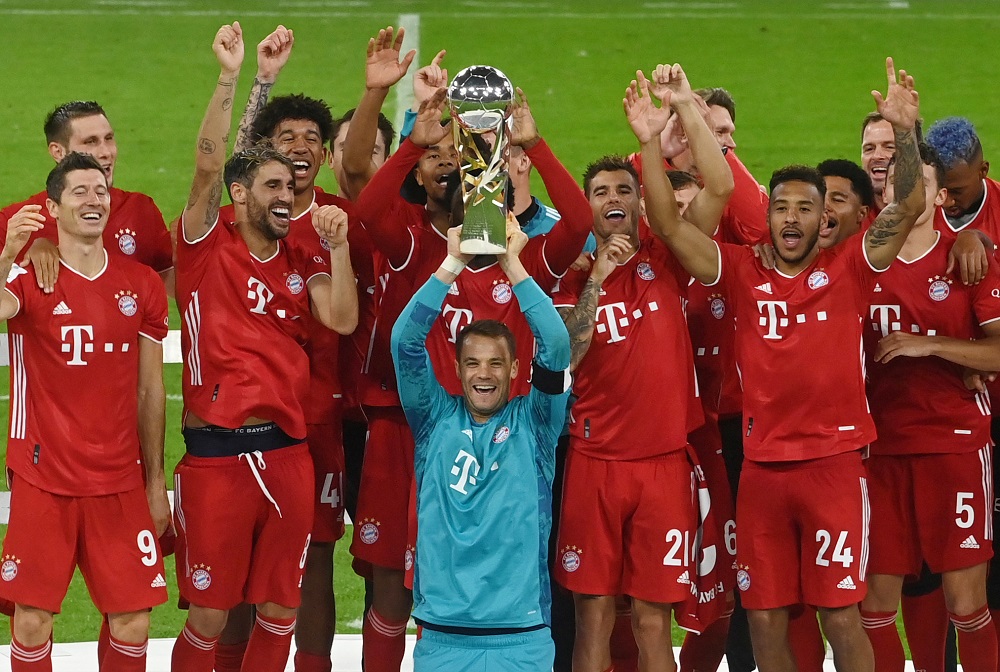 Bayern Munich's Manuel Neuer and teammates celebrate with the trophy after winning the Supercup, October 1, 2020. u00e2u20acu2022 Reuters pic