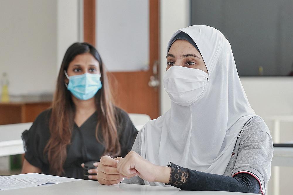 Baking enthusiast Nadia feels upset that refugees are blamed for spreading the virus. — Picture by Ahmad Zamzahuri