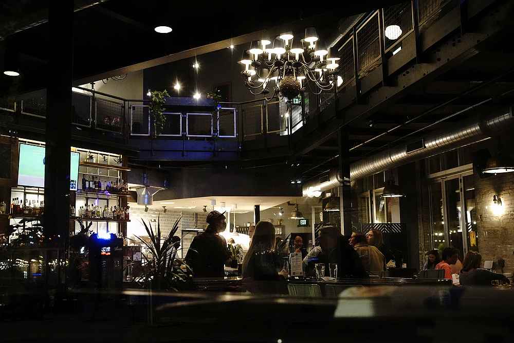 People dine inside Lucille's, a pizza restaurant, as the Covid-19 outbreak continues, in Madison, Wisconsin October 18, 2020. u00e2u20acu201d Reuters pic