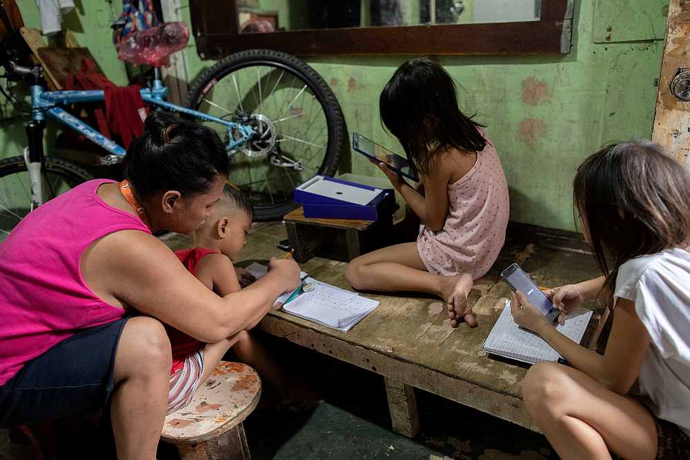Children take online classes as the Covid-19 outbreak stokes demand for internet services, in Tondo, Manila, Philippines October 6, 2020. — Reuters pic