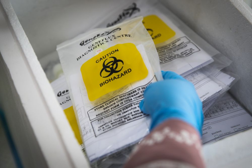 Healthcare workers collect swab samples to test for Covid-19 at the Selcare Clinic in Shah Alam October 4, 2020. u00e2u20acu201d Picture by Hari Anggara