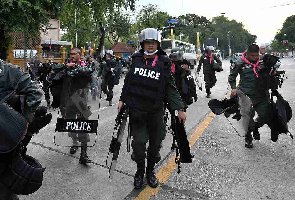 Police officers walk with their riot gear after a mass anti-government protest, on the 47th anniversary of the 1973 student uprising, in Bangkok, Thailand October 15, 2020. u00e2u20acu201d Reuters pic