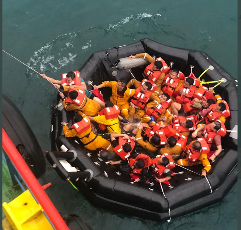 Crew members of Dayang Topaz are rescued from sea after their vessel collided with the beramB oil rig off Sarawak October 27, 2020. u00e2u20acu201d Picture via Twitter