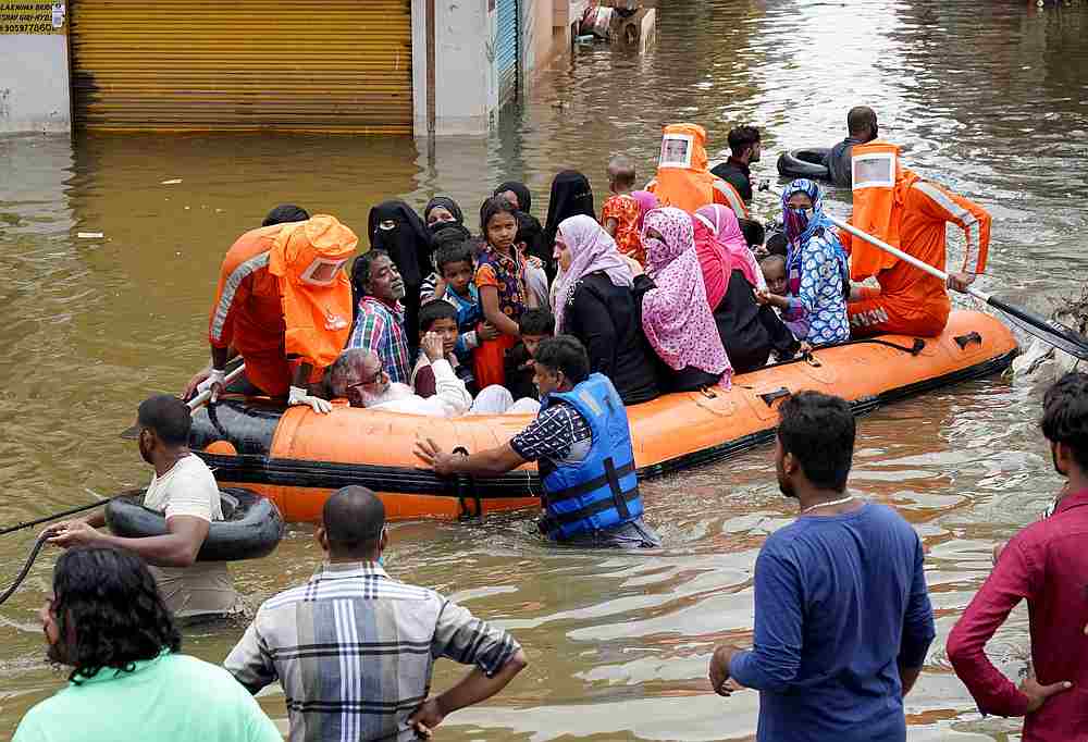 Residents are evacuated from a flooded neighbourhood after heavy rainfall in Hyderabad, the capital of the southern state of Telangana, India October 15, 2020. u00e2u20acu201d Reuters pic