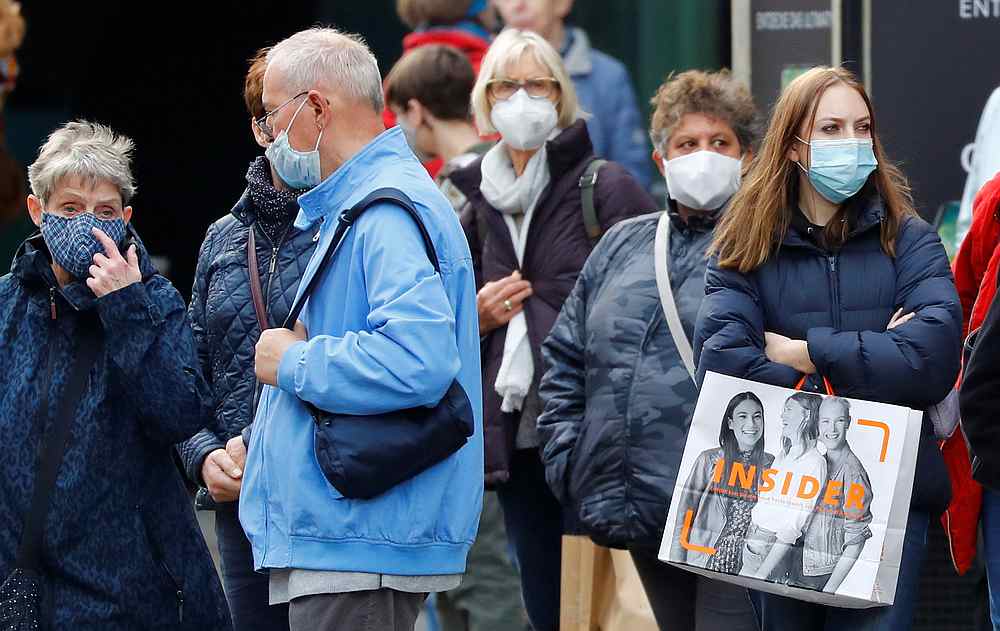 People wearing face masks at Schloss Strasse shopping street, as the Covid-19 outbreak continues, in Berlin, Germany October 20, 2020.  u00e2u20acu201d Reuters pic