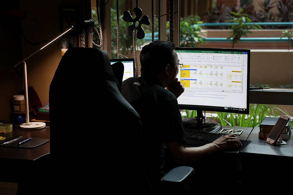 Jonathan Tan, managing director of UnaBiz, an Internet of Things network operator, says he has initially struggled with the transition to working from home. u00e2u20acu201d TODAY pic