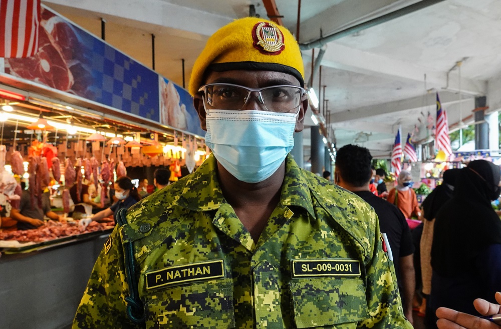Rela member P. Nathan said he will not panic buy but will stock up on canned goods should a lockdown happen. ― Picture by Miera Zulyana
