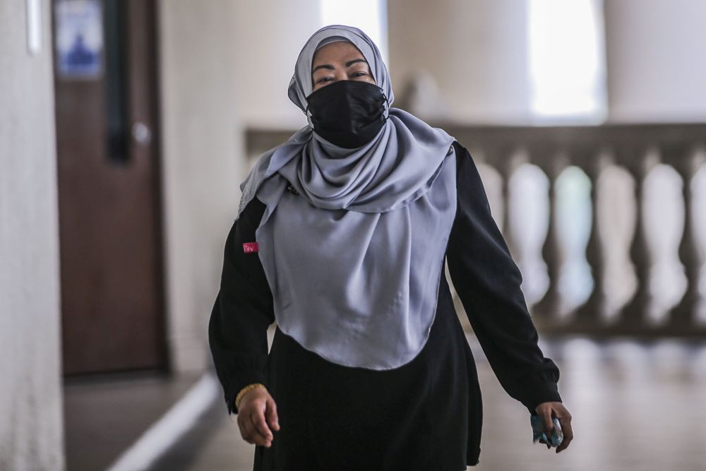 Former Malaysian External Intelligence Organisation chief Datuk Hasanah Abdul Hamid arrives at the Kuala Lumpur High Court October 6, 2020. u00e2u20acu201d Picture by Hari Anggara.