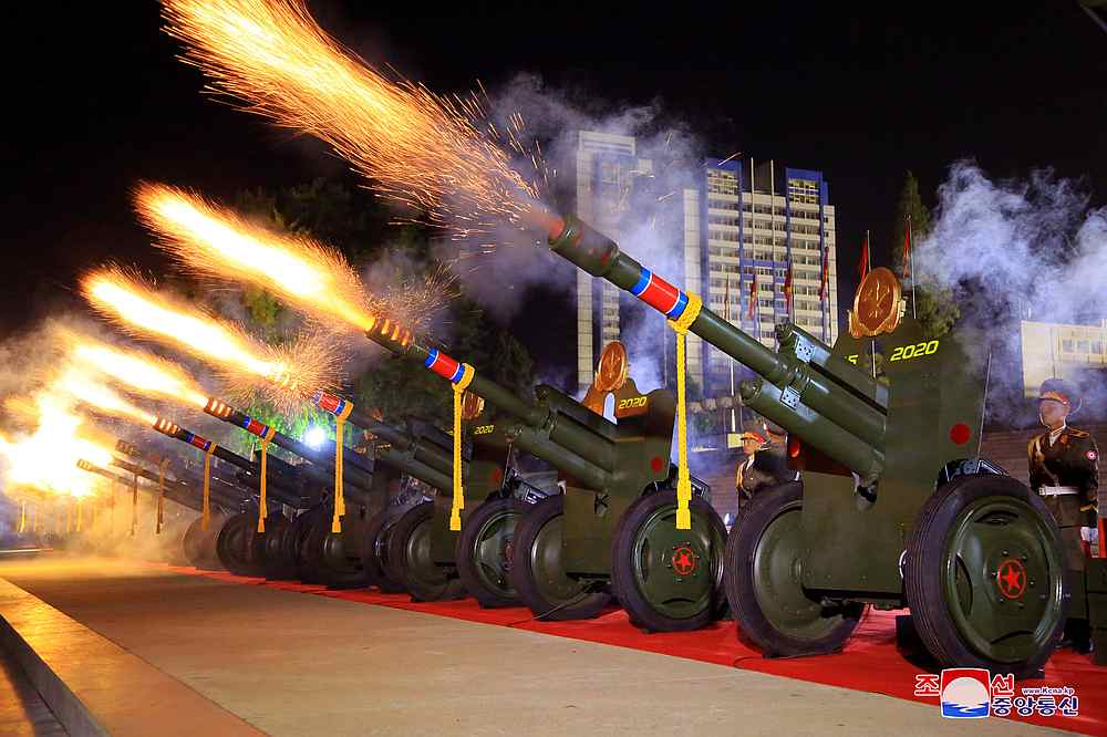 A gun salute is fired during a parade to mark the 75th anniversary of the founding of the ruling Workers' Party of Korea in this image released October 10, 2020. u00e2u20acu201d KCNA pic via Reuters