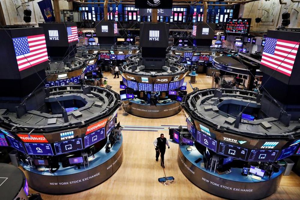 File picture shows a worker cleaning the floor of the New York Stock Exchange (NYSE), US, March 20, 2020. u00e2u20acu201d Reuters pic