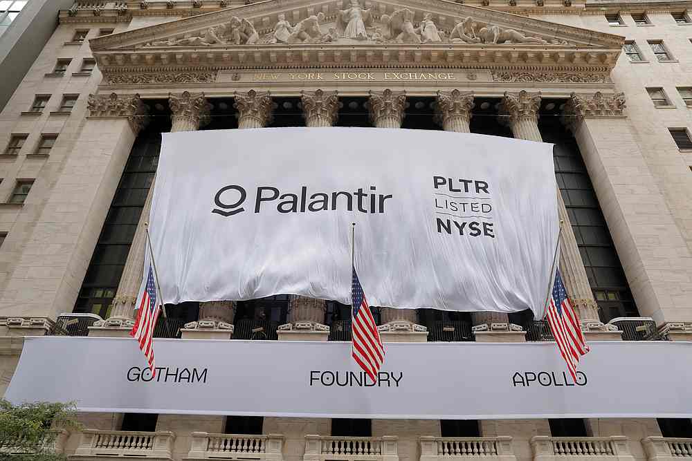 A banner featuring the logo of Palantir Technologies (PLTR) is raised at the New York Stock Exchange on the day of their initial public offering (IPO) in New York September 30, 2020 u00e2u20acu201d Reuters pic