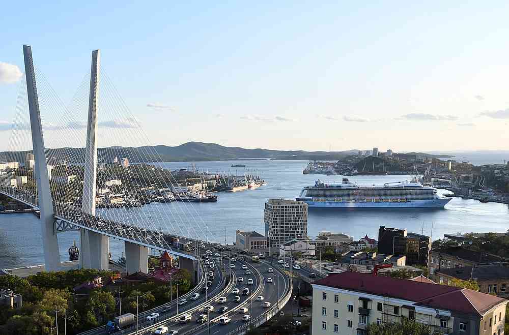A view shows a bridge over the Golden Horn bay and the Quantum of the Seas cruise ship at a port of Vladivostok, Russia September 18, 2019. u00e2u20acu201d Reuters pic