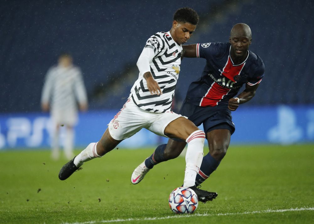 Manchester United's Marcus Rashford (left) scores their second goal against Paris St Germain at the Parc des Princes, Paris October 20, 2020. u00e2u20acu201d Reuters picnn