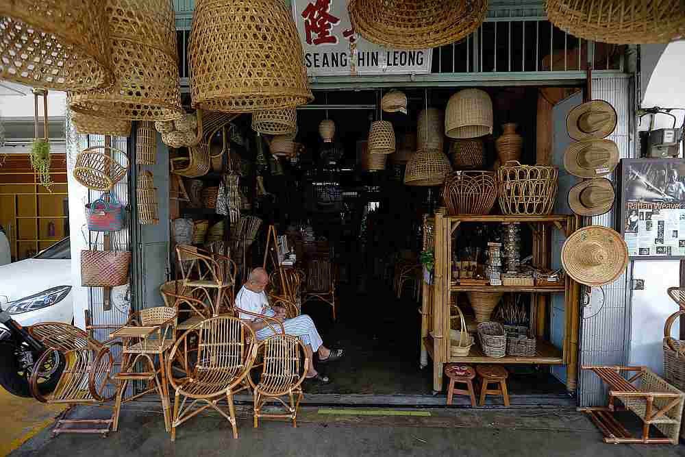 Rathadevi, 42, was seen serving the customer`s request at her shop in GR Florist at Jalan Masjid Kapitan Keling. u00e2u20acu201d Picture by Sayuti Zainudin