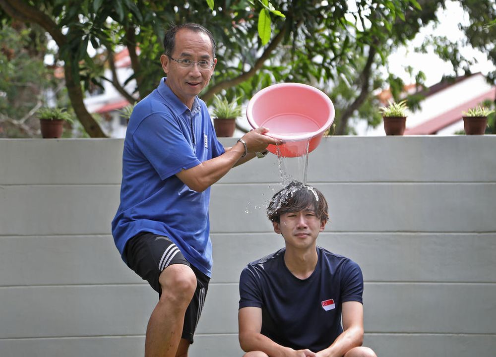 Ng Ming Wei and his father Cedric Ng started making prank videos together when they had to stay home due to Covid-19. u00e2u20acu201d TODAY pic