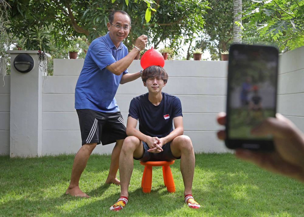 Taekwondo athlete Ng Ming Wei and his father Cedric Ng posted their first video together on the young man’s TikTok account on May 1, 2020. — TODAY pic