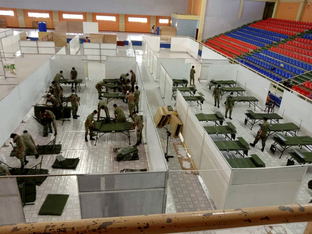Staff of the Malaysian Armed Forces Hospital (ATM) busy arranging and completing equipment at the Medan ATM Hospital, located at the Tawau Sports Complex which is expected to start operating on October 20, in Tawau October 18, 2020. u00e2u20acu201d Bernama pic 