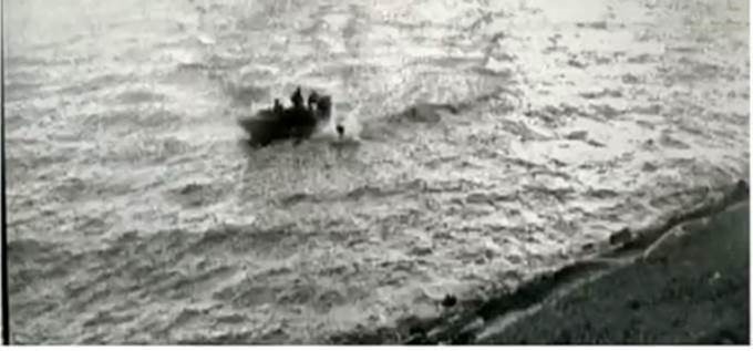 The four men jumped off an unnumbered boat into the waters off Tuas Reclaimed Land. — Picture courtesy of Police Coast Guard via TODAY 