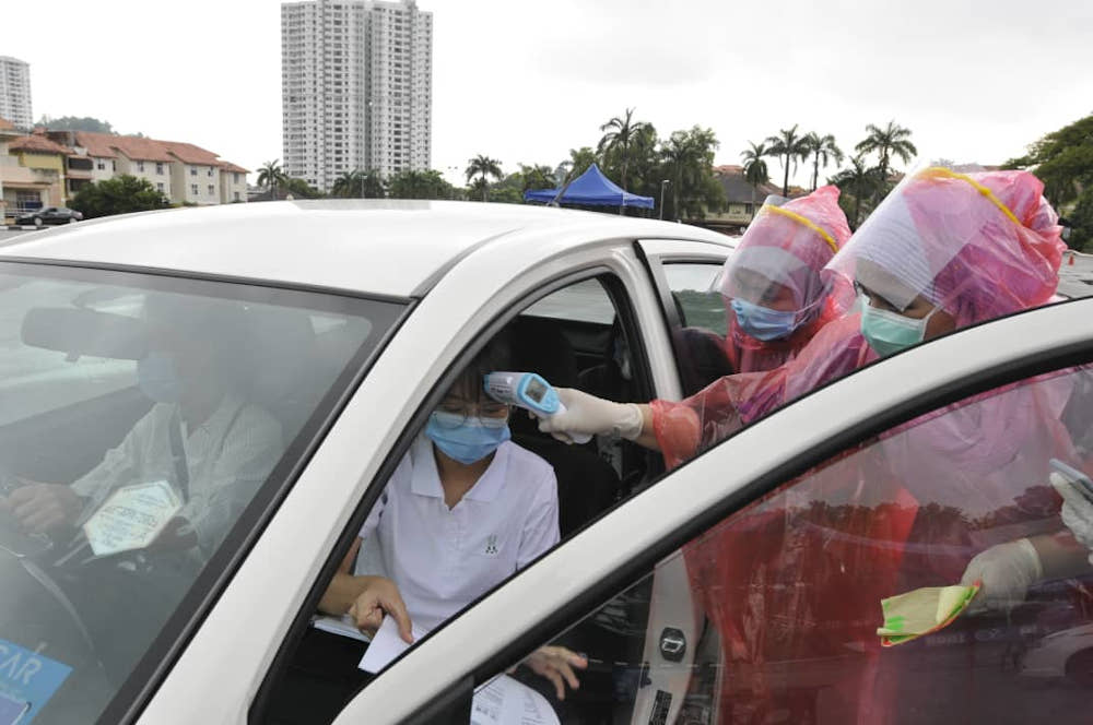 Universiti Sains Malaysia introduced a drive-through registration process for new students October 2, 2020. u00e2u20acu201d Picture courtesy of USM