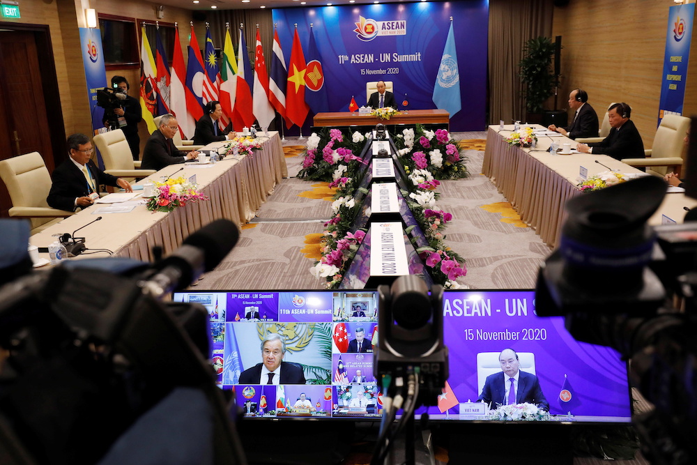 UN Secretary-General Antonio Guterres is seen on a screen while speaking from the UN headquarters as Vietnam's Prime Minister Nguyen Xuan Phuc listens during the 11th Asean-UN summit in Hanoi, Vietnam November 15, 2020. u00e2u20acu201d Reuters pic