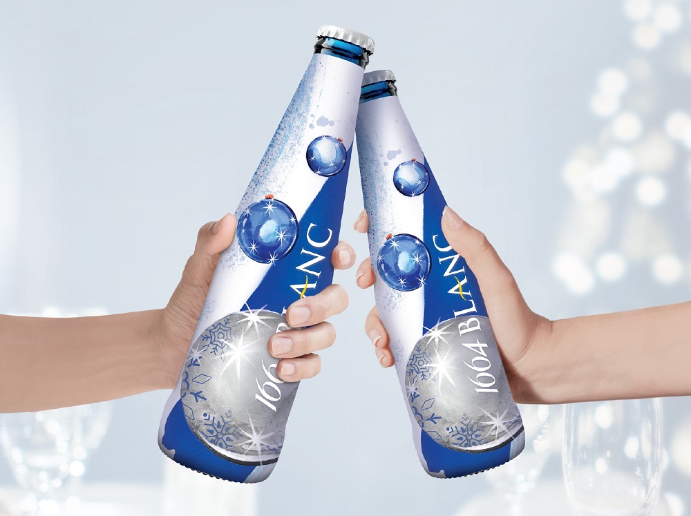 The limited-edition Christmas bottles feature abstract swirls and sparkles available only in Malaysia. u00e2u20acu2022 Picture courtesy of Carlsberg Malaysia