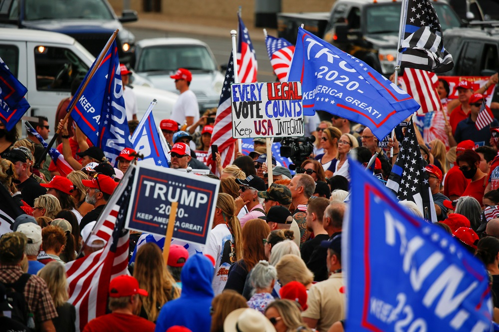 Supporters of US President Donald Trump gather during a protest about the early results of the 2020 presidential election, in front of the Maricopa County Tabulation and Election Centre in Phoenix November 6, 2020. u00e2u20acu201d Reuters pic