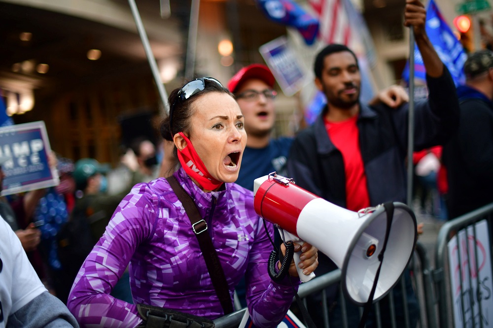 A supporter of US President Donald Trump yells at a supporter of Democratic presidential nominee Joe Biden after Biden surpassed Trumpu00e2u20acu2122s lead in Philadelphia November 6, 2020. u00e2u20acu201d Reuters pic