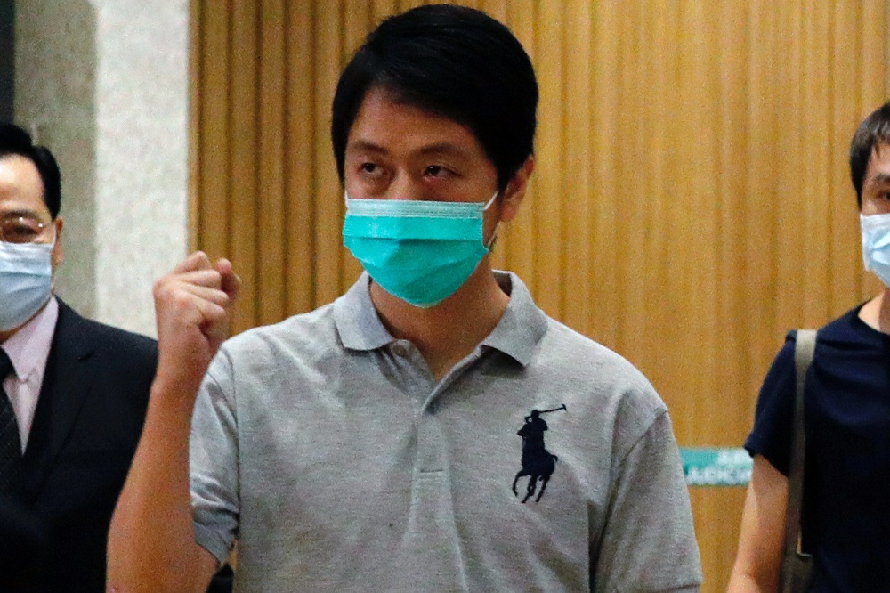 Democratic Party lawmaker Ted Hui Chi-fung raises his fist upon his release on bail over anti-government protests in July last year at West Kowloon Magistrates' Courts, in Hong Kong August 27, 2020. u00e2u20acu201d Reuters pic
