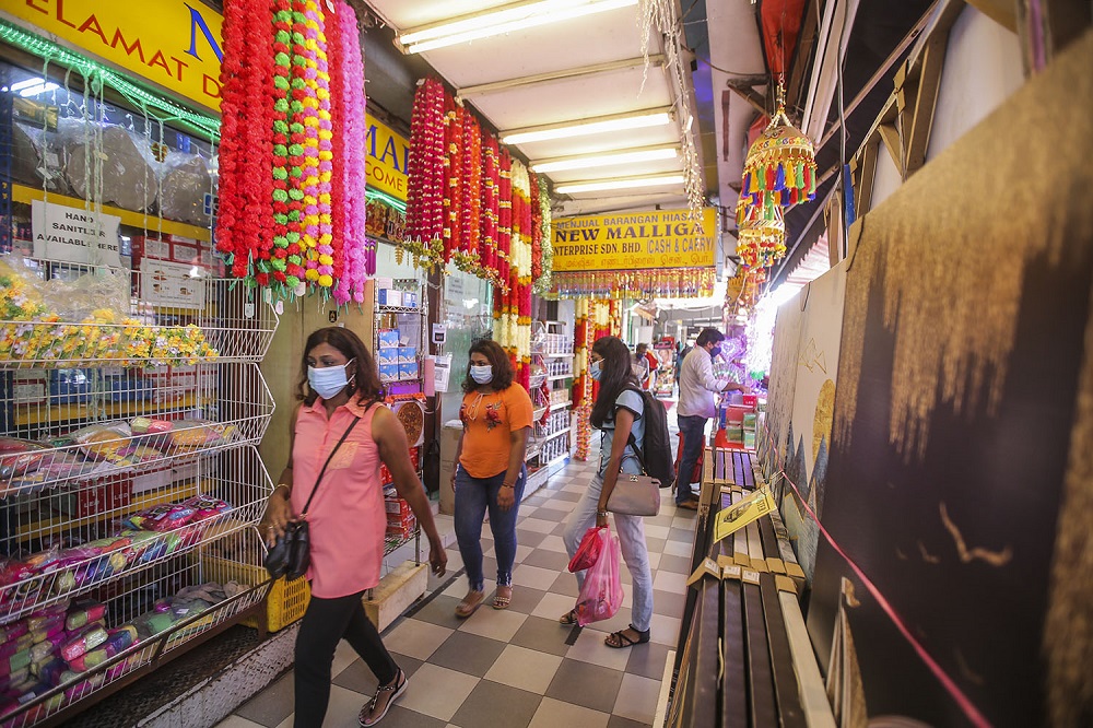 People shop at Brickfields ahead of the Deepavali celebrations in Kuala Lumpur November 11, 2020. u00e2u20acu201d Picture by Hari Anggara