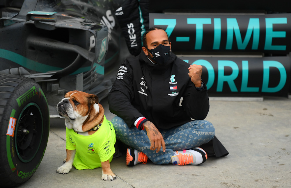 Mercedes' Lewis Hamilton poses with his dog Roscoe as he celebrates after winning the Turkish Grand Prix at Istanbul Park, Istanbul, Turkey November 15, 2020. u00e2u20acu201d Reuters pic